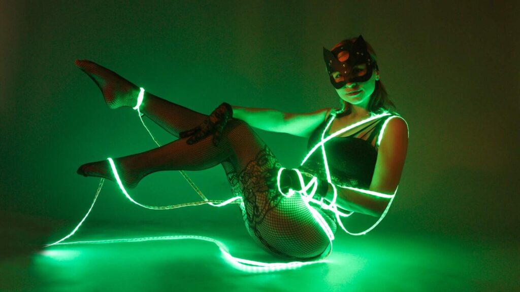 No-Face Chaturbate Model in Black Lingerie Tied with Illuminated Led Light Strip