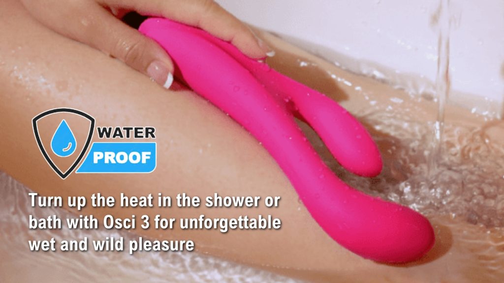 Woman holding the Lovense Osci 3 against her leg while filling a bath with water